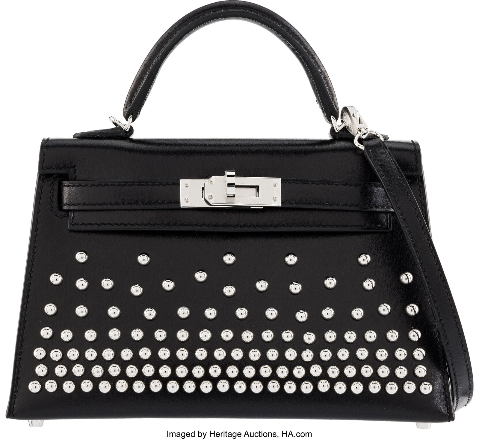Hermès 20cm Black Box Calf Leather Cloutè Mini: Hermès 20cm Black Box Calf Leather Cloutè Mini Kelly with Palladium Hardware W, 2024 Condition: 1 8" Width x 4.5" Height x 1.25" Depth This bag is done in Black