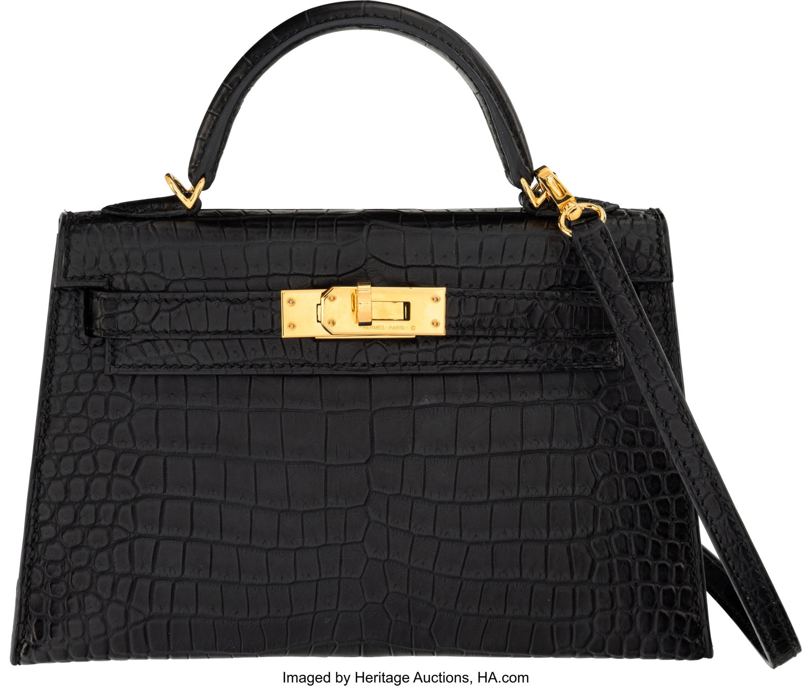 Hermès 20cm Matte Black Porosus Crocodile Mini : Hermès 20cm Matte Black Porosus Crocodile Mini Kelly with Gold Hardware B, 2023 Condition: 2 7.5" Width x 4.5" Height x 2.5" Depth This bag is done in Matte Bla