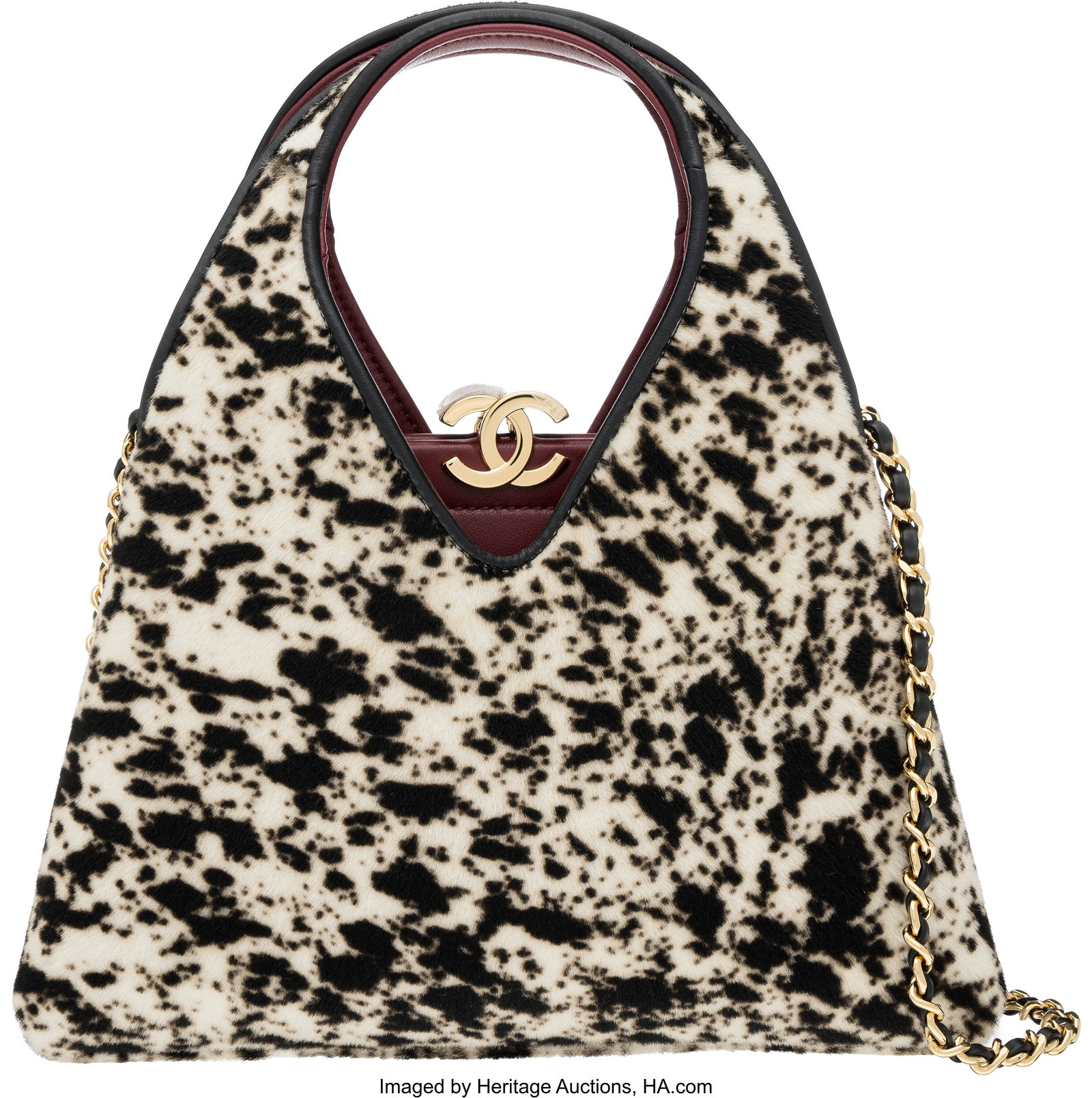 Chanel Black & White Ponyhair Small Chic Lady Sh: Chanel Black & White Ponyhair Small Chic Lady Shopping Bag with Gold Hardware Métiers d'art 2026 Condition: 1 8.75" Width x 6" Height x 3" Depth This bag is done in Black and W