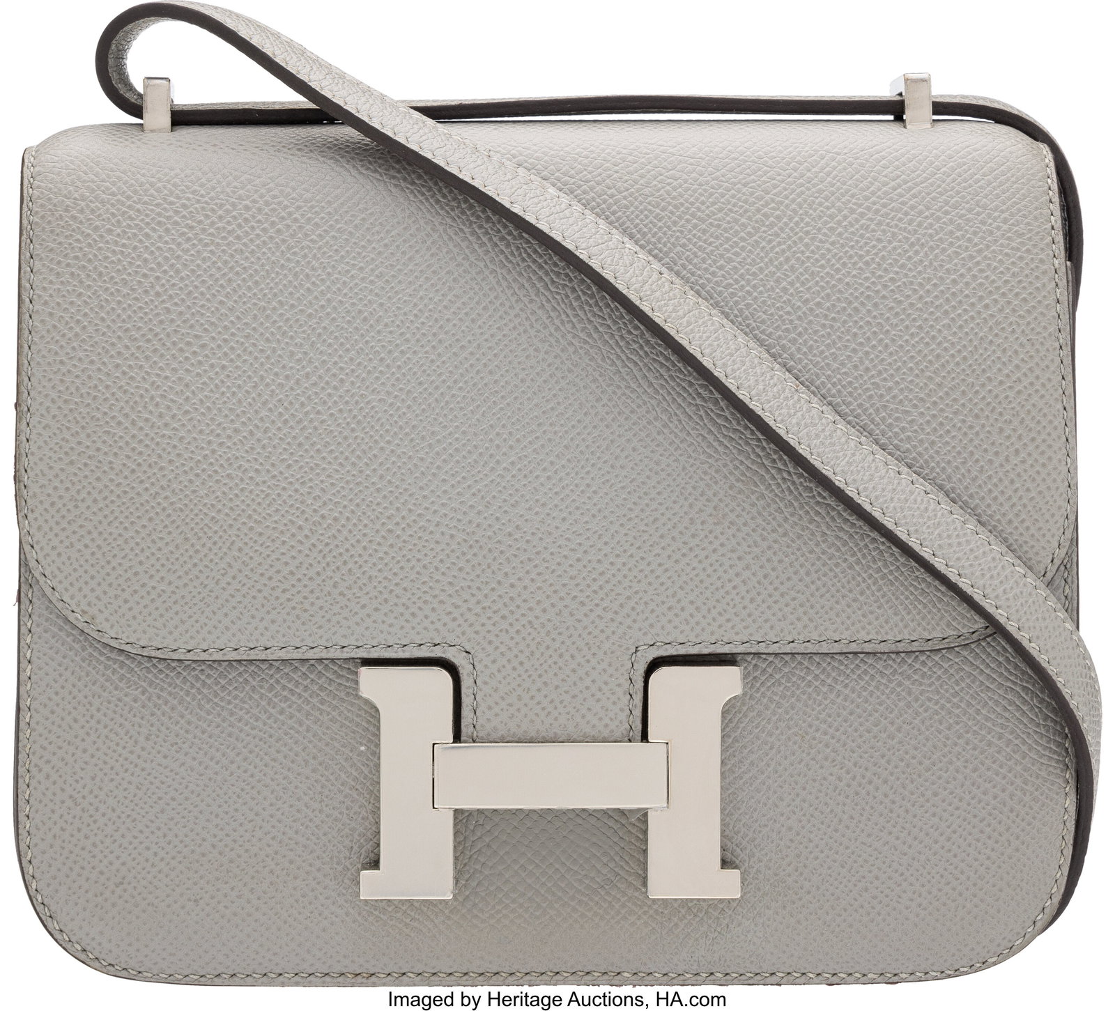 Hermès 18cm Gris Mouette Epsom Leather Mini Con: Hermès 18cm Gris Mouette Epsom Leather Mini Constance Bag with Palladium Hardware X, 2016 Condition: 2 7.25" Width x 6" Height x 1.5" Depth This bag is done in Gris Mo