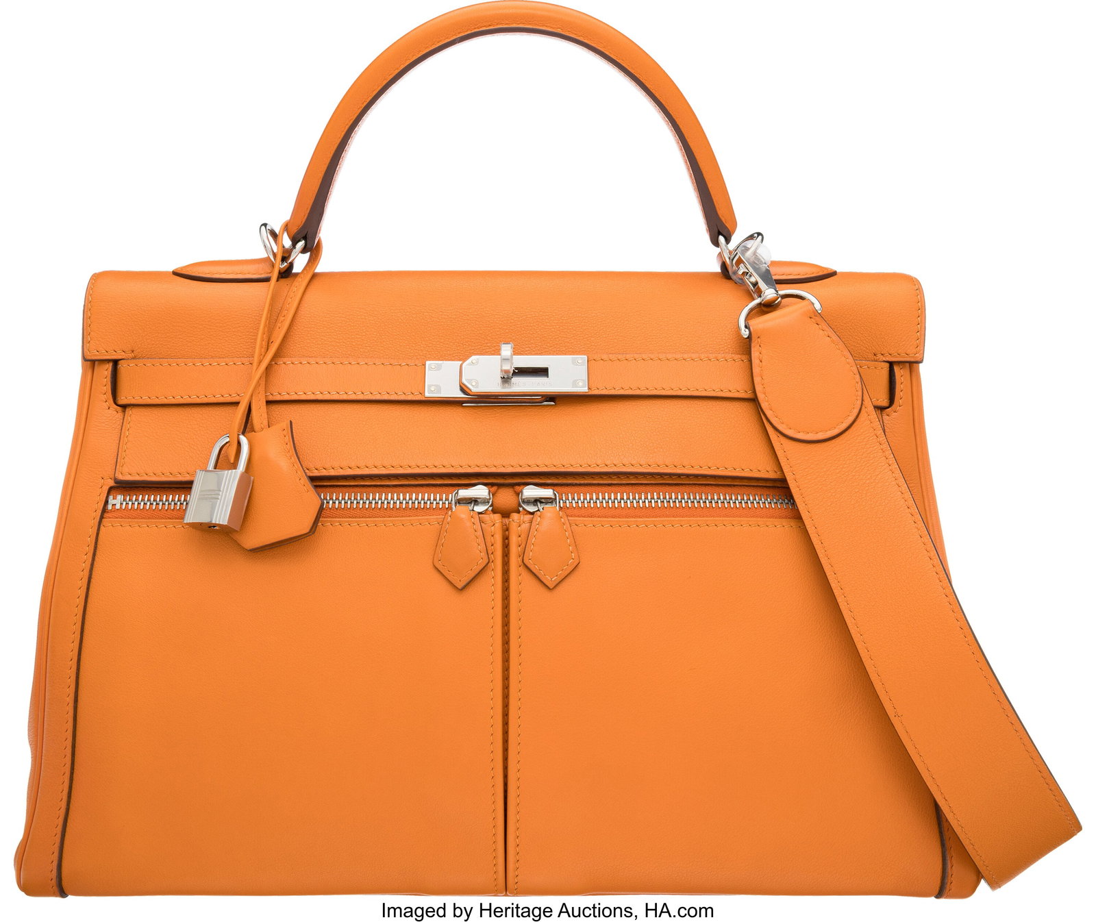 Hermès 35cm Orange Swift Leather Kelly Lakis Ba: Hermès 35cm Orange Swift Leather Kelly Lakis Bag with Palladium Hardware N Square, 2010 Condition: 2 13.75" Width x 9.5" Height x 5" Depth This bag is done in Orange S
