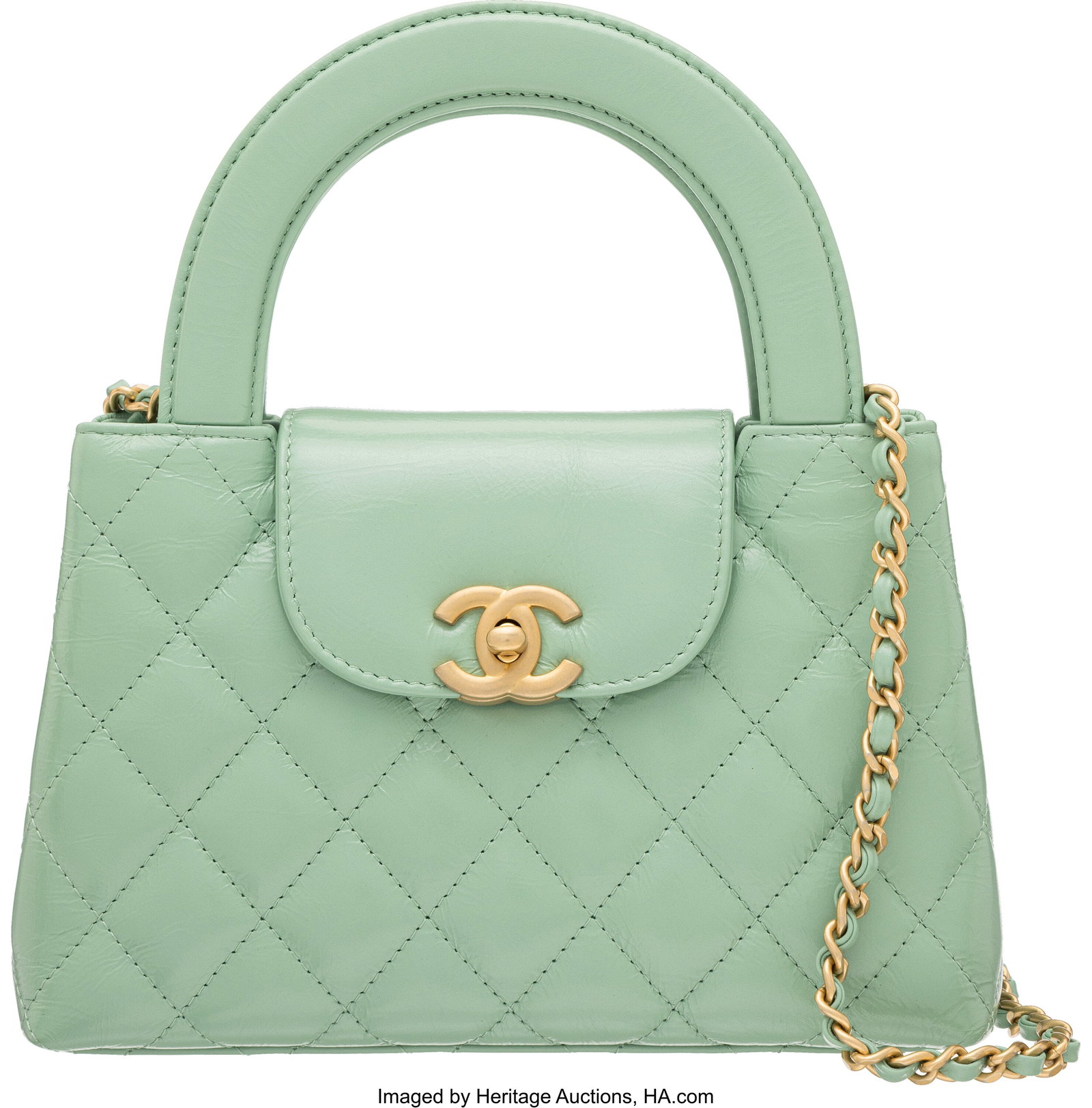 Chanel Mint Green Quilted Shiny Aged Calfskin Le: Chanel Mint Green Quilted Shiny Aged Calfskin Leather Mini Kelly Shopper with Aged Gold Hardware Condition: 1 7.5" Width x 5" Height x 2.25" Depth This bag is done in Mint Green Bl