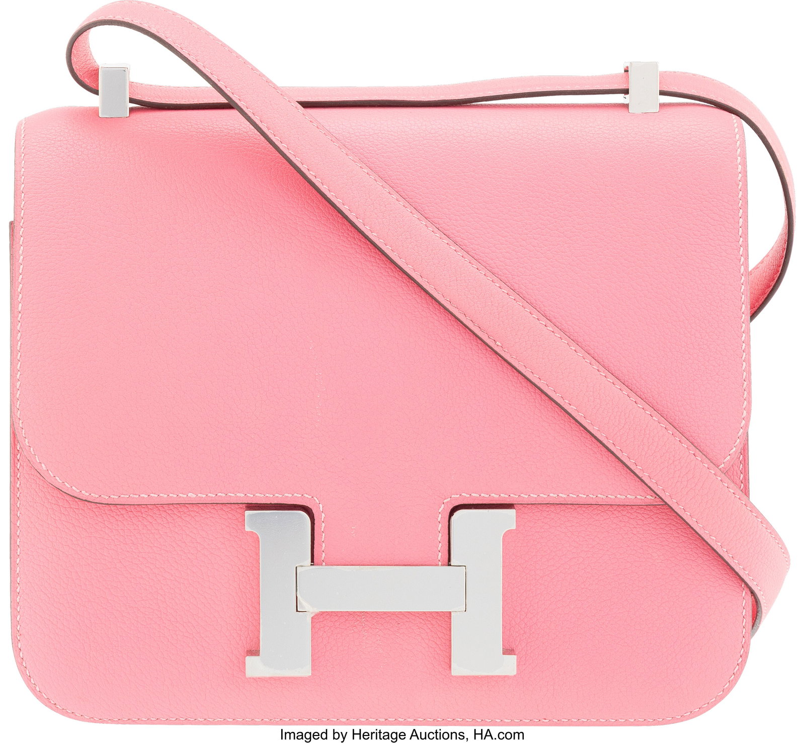 Hermès 24cm Rose Azalee Evercolor Leather Const: Hermès 24cm Rose Azalee Evercolor Leather Constance Bag with Palladium Hardware A, 2017 Condition: 2 9" Width x 7.5" Height x 2.25" Depth This bag is done in Rose Azal
