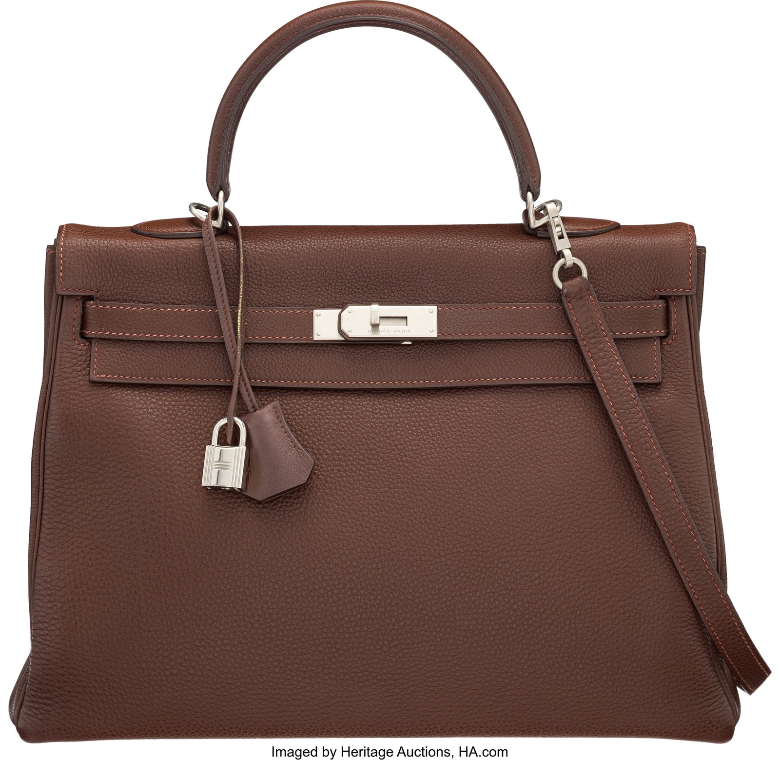 Hermès 35cm Havane Togo Leather Kelly Retourne : Hermès 35cm Havane Togo Leather Kelly Retourne Bag with Brushed Palladium Hardware D Square, 2000 Condition: 2 13.5" Width x 10" Height x 5" Depth This bag is done in Havane 
