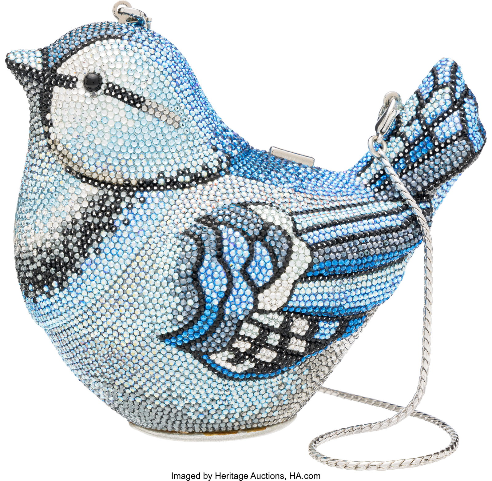 Judith Leiber Blue Crystal Bird Minaudière with: Judith Leiber Blue Crystal Bird Minaudière with Silver Hardware Condition: 1 5.5" Width x 5" Height x 3.5" Depth This minaudière is done in Multi-Tone Blue Crystals w