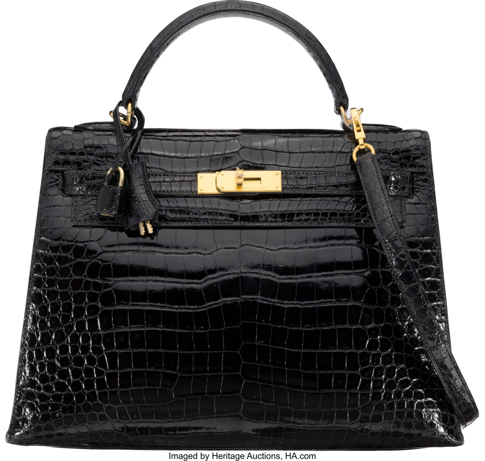 Hermès 32cm Shiny Black Porosus Crocodile Kelly: Hermès 32cm Shiny Black Porosus Crocodile Kelly Sellier Bag with Gold Hardware G Square, 2003 Condition: 3 12.5" Width x 10" Height x 4.5" Depth This bag is done in Sh