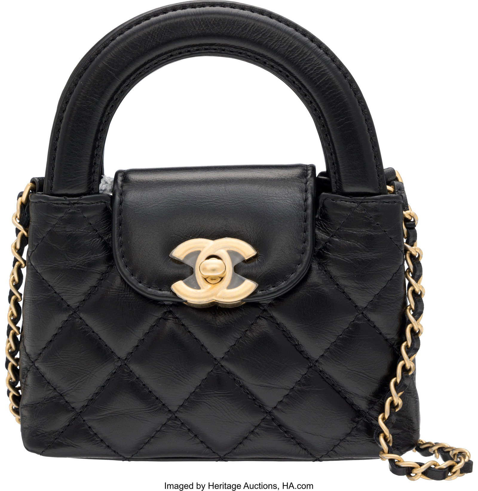 Chanel Black Quilted Calfskin Leather Nano Kelly: Chanel Black Quilted Calfskin Leather Nano Kelly Shopper Bag with Brushed Hold Hardware Condition: 1 7.75" Width x 5.25" Height x 2.5" Depth This bag is done in Black Calfsk