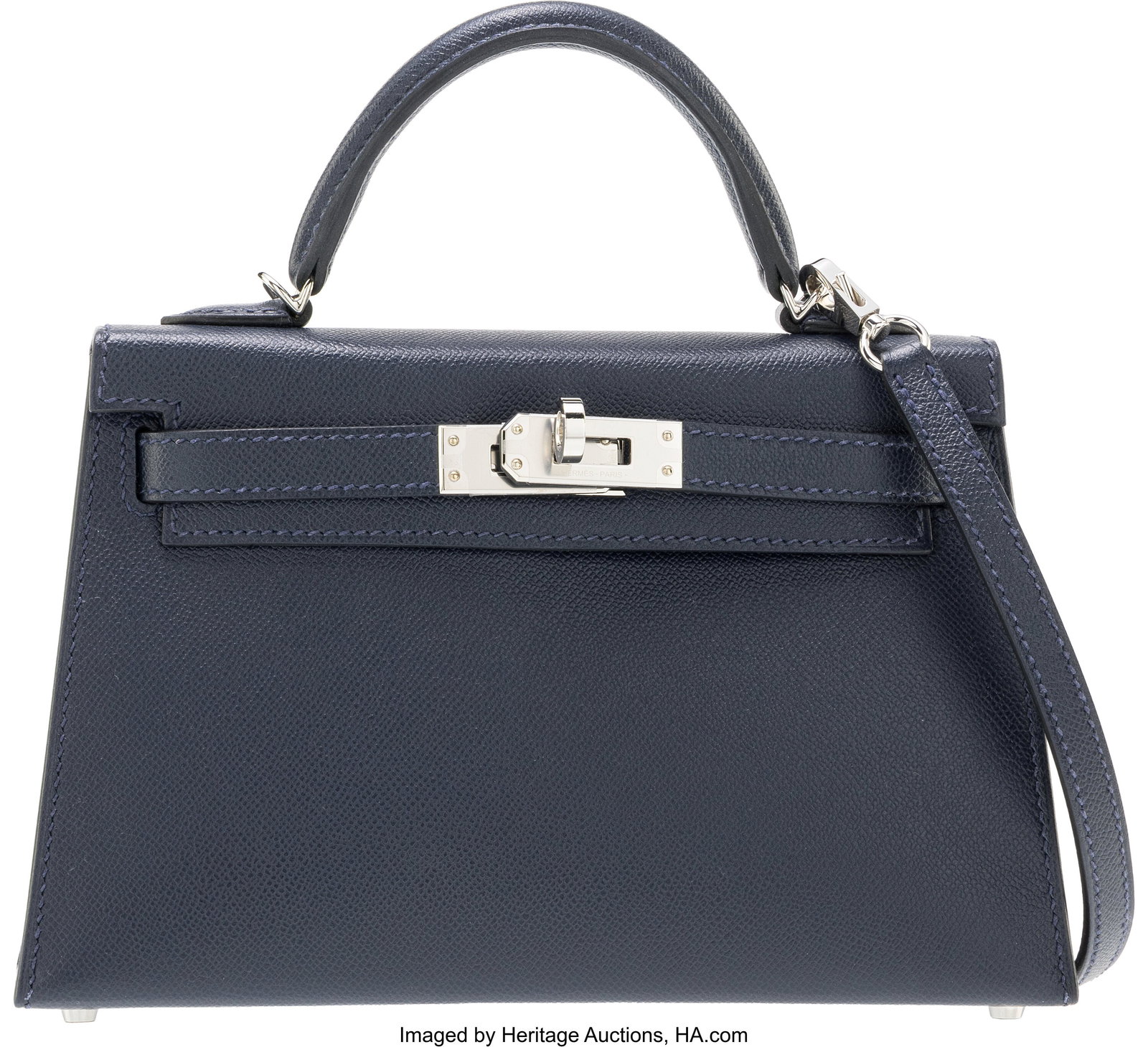 Hermès 20cm Bleu Nuit Madame Leather Mini Kelly: Hermès 20cm Bleu Nuit Madame Leather Mini Kelly with Palladium Hardware K, 2025 Condition: 1 7.5" Width x 4.5" Height x 2" Depth This bag is done in Bleu Nuit Madame