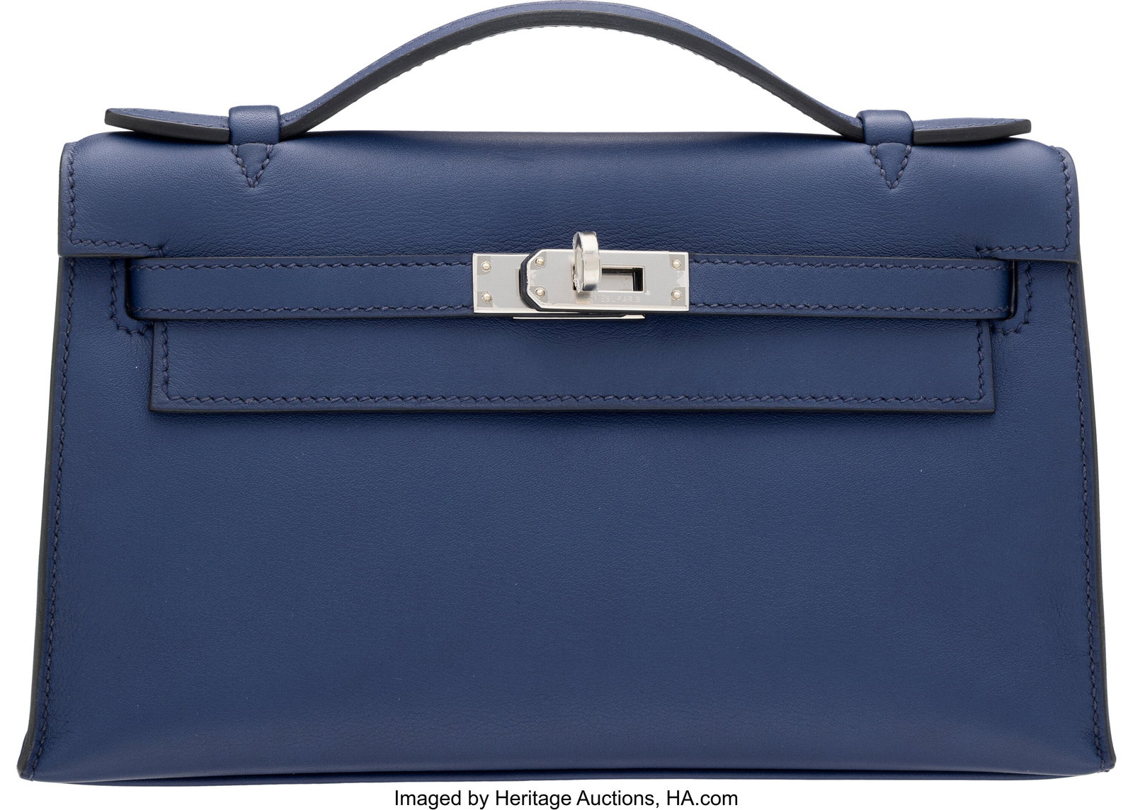 Hermès Bleu Saphir Swift Leather Kelly Pochette: Hermès Bleu Saphir Swift Leather Kelly Pochette with Palladium Hardware T, 2015 Condition: 2 8.5" Width x 4.75" Height x 2.5" Depth This bag is done in Bleu