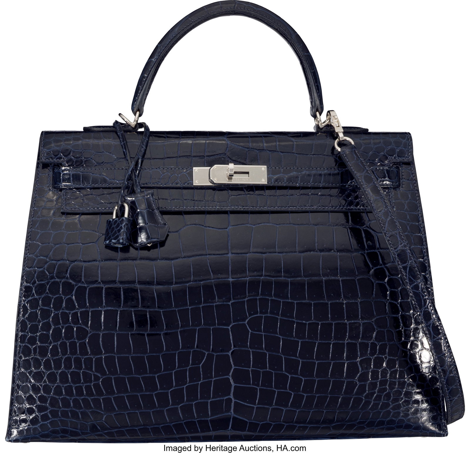 Hermès 35cm Shiny Bleu Marine Porosus Crocodile: Hermès 35cm Shiny Bleu Marine Porosus Crocodile Kelly Sellier Bag with Palladium Hardware X, 2016 Condition: 3 13.5" Width x 10" Height x 5" Depth This bag is done in Shiny
