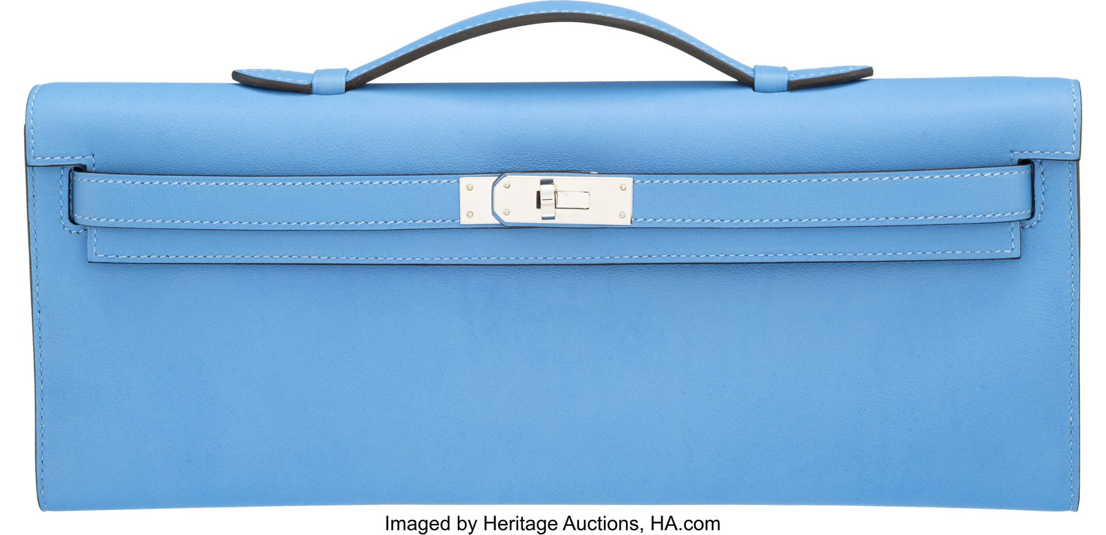 Hermès Bleu Paradis Swift Leather Kelly Cut Clu: Hermès Bleu Paradis Swift Leather Kelly Cut Clutch with Palladium Hardware T, 2015 Condition: 2 12" Width x 5" Height x 1" Depth This clutch is done in Bleu Paradis Swift Leather