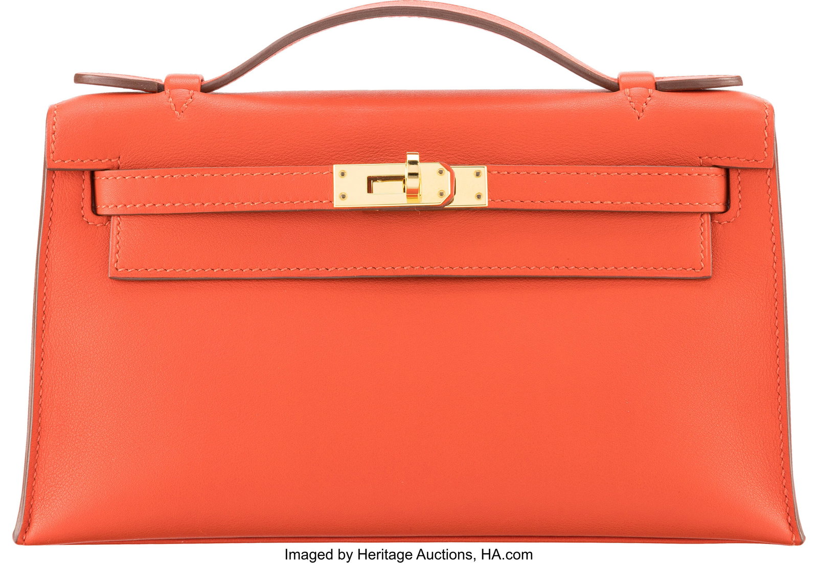 Hermès Capucine Swift Leather Kelly Pochette wi: Hermès Capucine Swift Leather Kelly Pochette with Gold Hardware T, 2015 Condition: 2 8.5" Width x 4.75" Height x 2.5" Depth This bag is done in Capucine Swift L