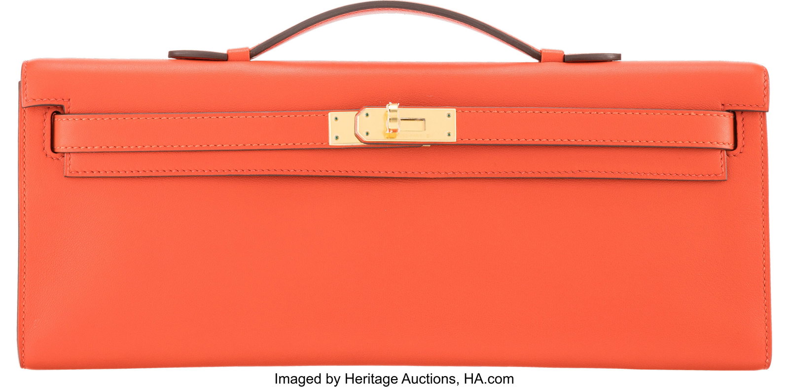 Hermès Capucine Swift Leather Kelly Cut Clutch : Hermès Capucine Swift Leather Kelly Cut Clutch with Gold Hardware A, 2017 Condition: 2 12" Width x 5" Height x 1" Depth This clutch is done in Capucine Swift Leather with Gold Hardw