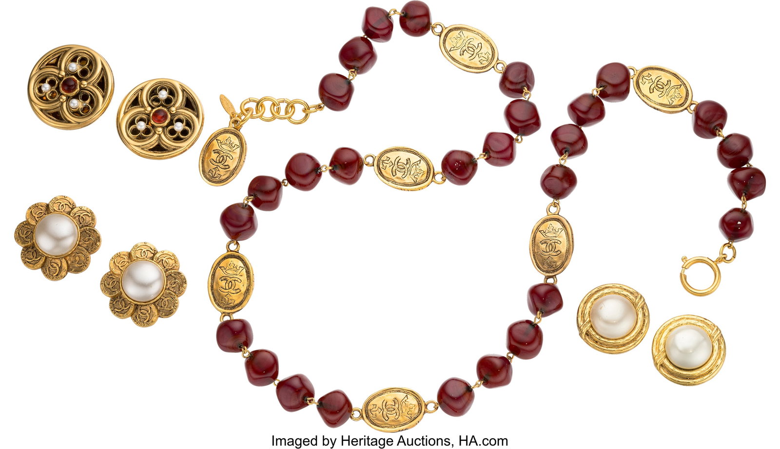 Chanel Set of Four: Vintage Red Gripoix Necklace: Chanel Set of Four: Vintage Red Gripoix Necklace & Earrings See Extended Condition Report for Details. This set includes: Chanel Vintage Gold Plated Red Gripoix Medallion Neckla