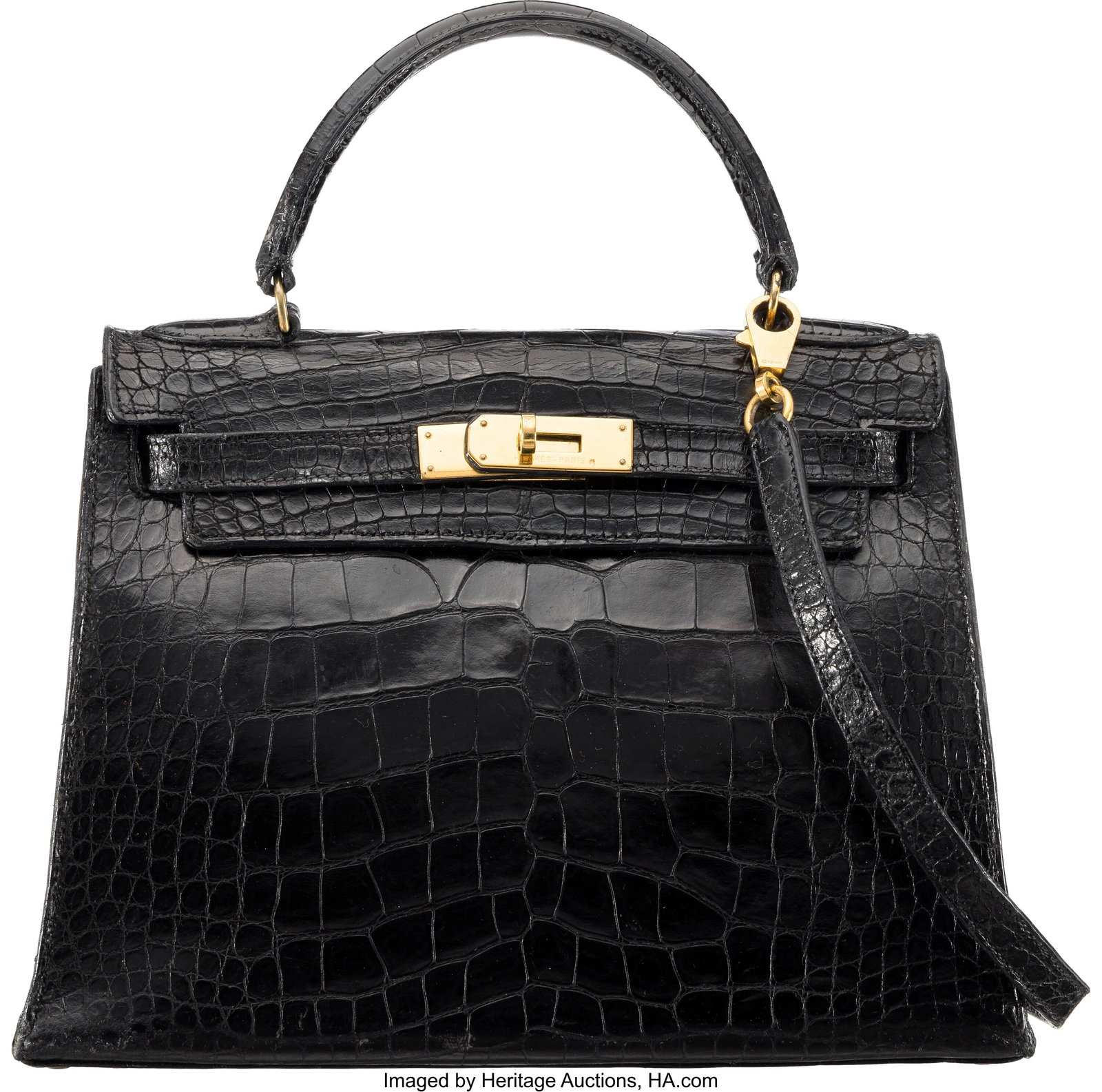 Hermès Vintage 28cm Shiny Black Alligator Kelly: Hermès Vintage 28cm Shiny Black Alligator Kelly Sellier Bag with Gold Hardware H Circle, 1978 Condition: 4 11" Width x 8.5" Height x 4.5" Depth This bag is done in Shi