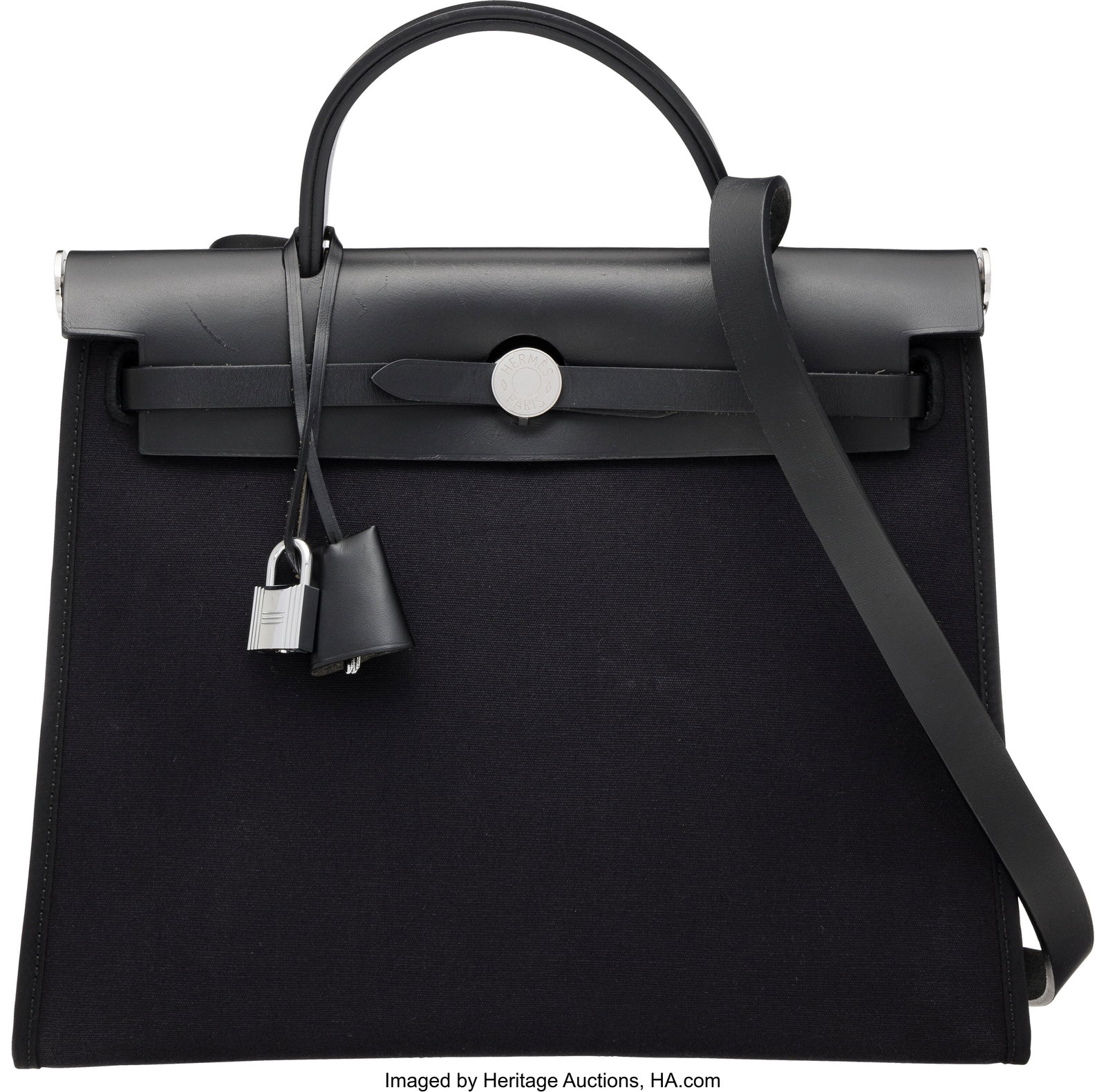 Hermès 31cm Black Vache Hunter Leather & Toile : Hermès 31cm Black Vache Hunter Leather & Toile Herbag Zip with Palladium Hardware X, 2016 Condition: 3 12" Width x 10" Height x 4.5" Depth This bag is done in Black Vache