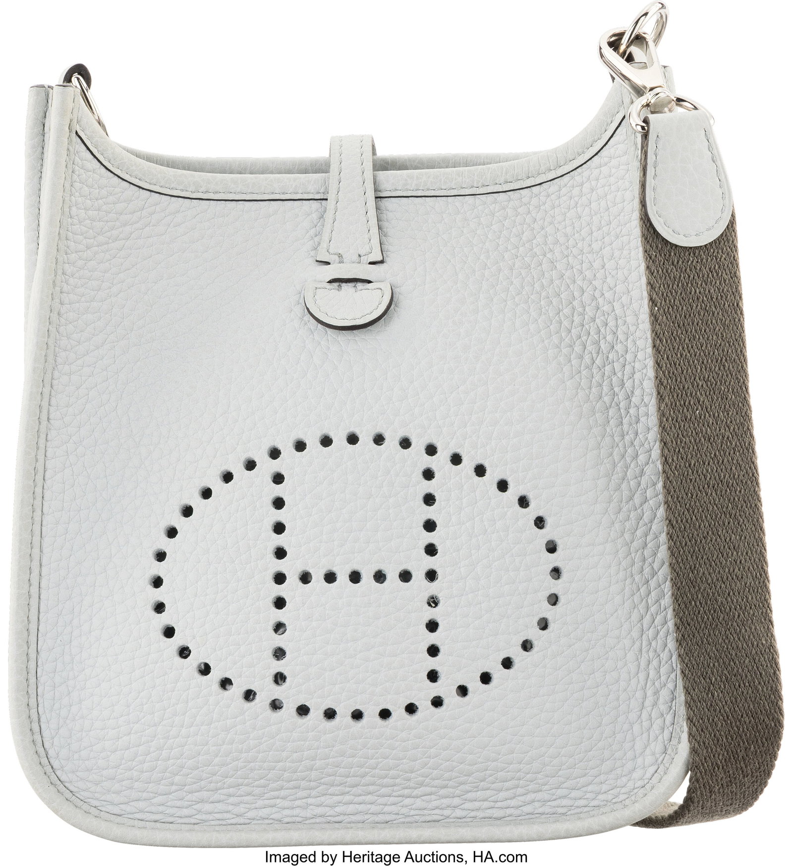 Hermès 16cm Bleu Pale & Etain Clemence Leather : Hermès 16cm Bleu Pale & Etain Clemence Leather TPM Evelyne Bag with Palladium Hardware U, 2022 Condition: 2 6.25" Width x 7" Height x 2" Depth This bag is done in Bleu Pa