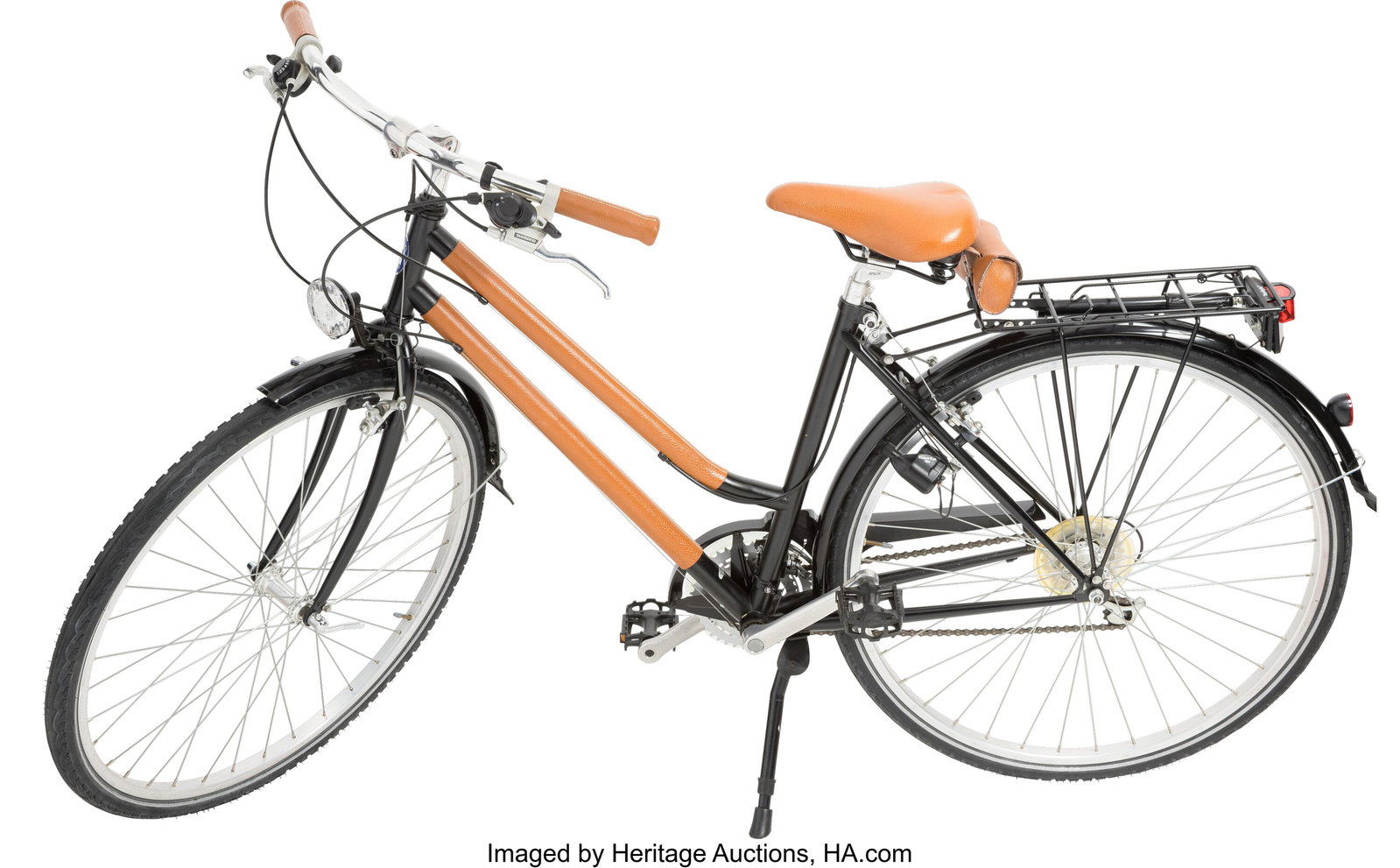Hermès x Peugeot Gold Leather & Black Carbon Bi: Hermès x Peugeot Gold Leather & Black Carbon Bicycle Circa 1990s Condition: 3 68" Length This bicycle, created in collaboration between Hermès and Peugeot, is done 