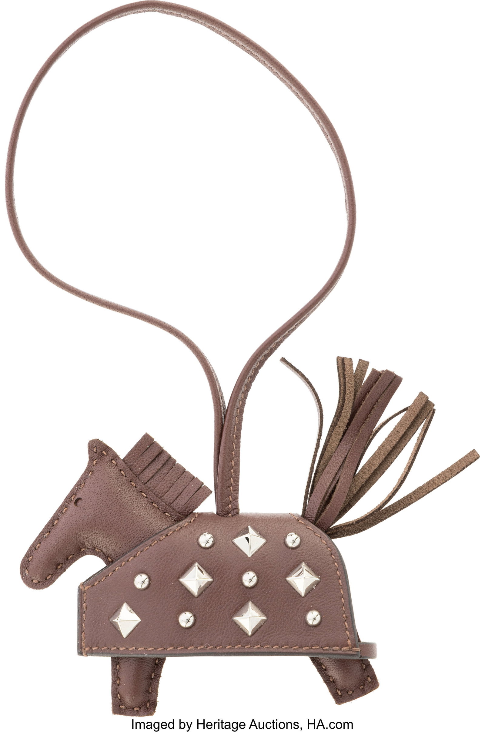 Hermès Terre Milo Lambskin Leather Rodeo Rock C: Hermès Terre Milo Lambskin Leather Rodeo Rock Charm with Palladium Hardware G, 2026 Condition: 1 3.5" Width x 3" Height This charm is done in Terre Milo Lambskin Leather with