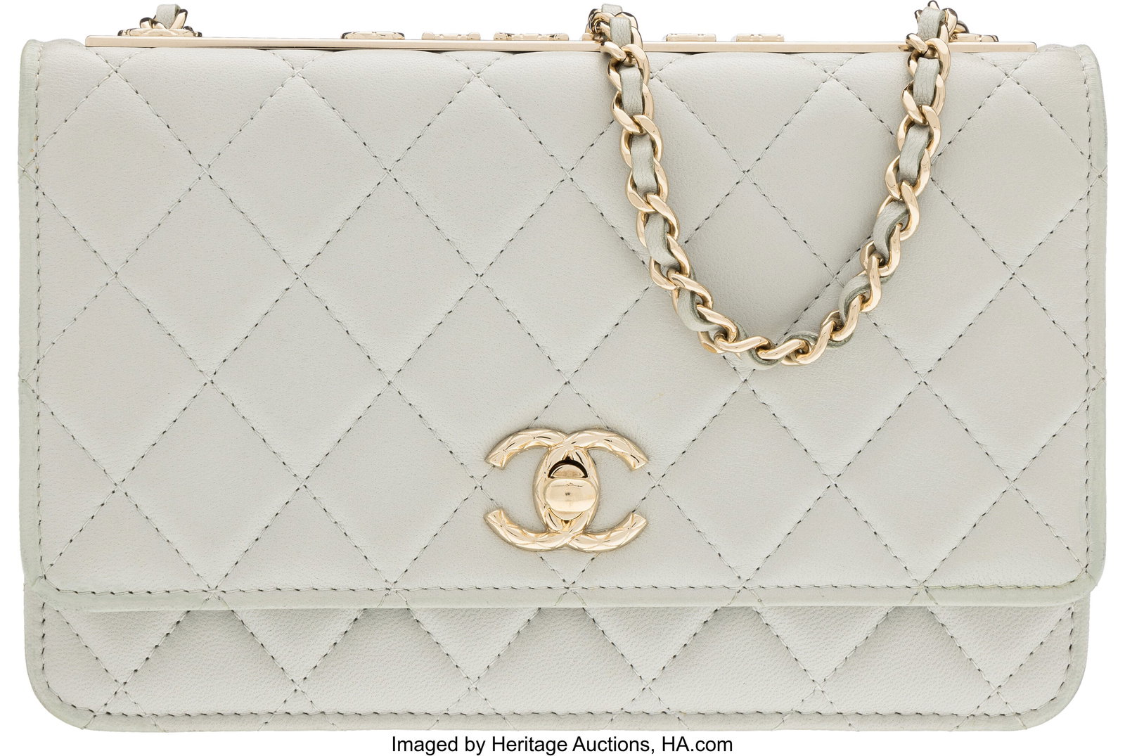 Chanel Light Gray Quilted Lambskin Leather Trend: Chanel Light Gray Quilted Lambskin Leather Trendy Wallet On Chain with Light Gold Hardware Condition: 2 7.5" Width x 5" Height x 1.5" Depth This bag is done in Light Gray Lambskin 