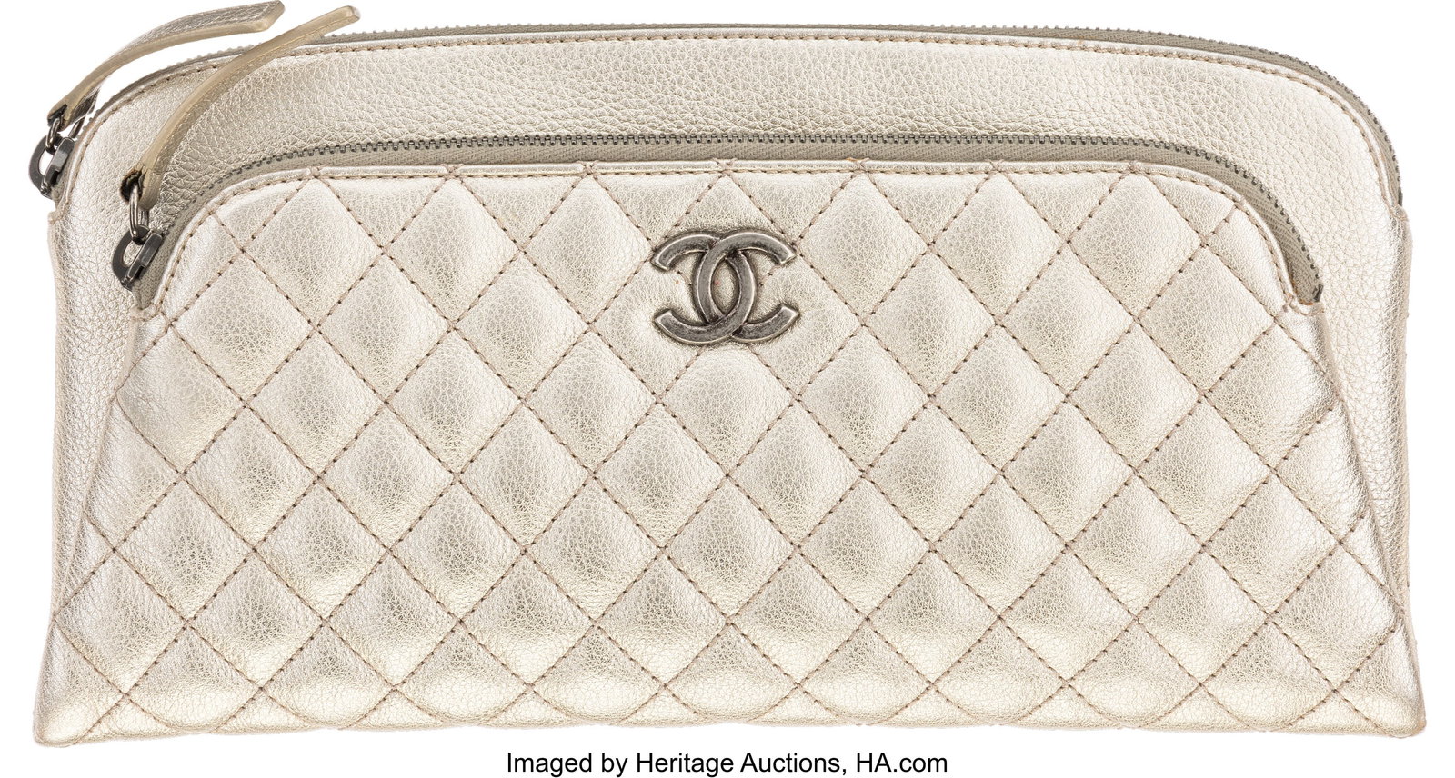 Chanel Metallic Silver Quilted Calfskin Leather : Chanel Metallic Silver Quilted Calfskin Leather Double Zip Clutch with Aged Ruthenium Hardware 2016-2017 Condition: 2 11" Width x 6.5" Height x 1" Depth This bag is done in Metallic Silve