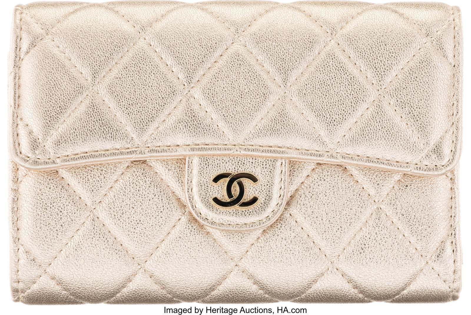 Chanel Metallic Champagne Gold Quilted Lambskin : Chanel Metallic Champagne Gold Quilted Lambskin Leather Flap Wallet with Light Gold Hardware 2020 Condition: 2 6" Width x 4" Height x 1" Depth This wallet is done in Metallic Champagne Gold with