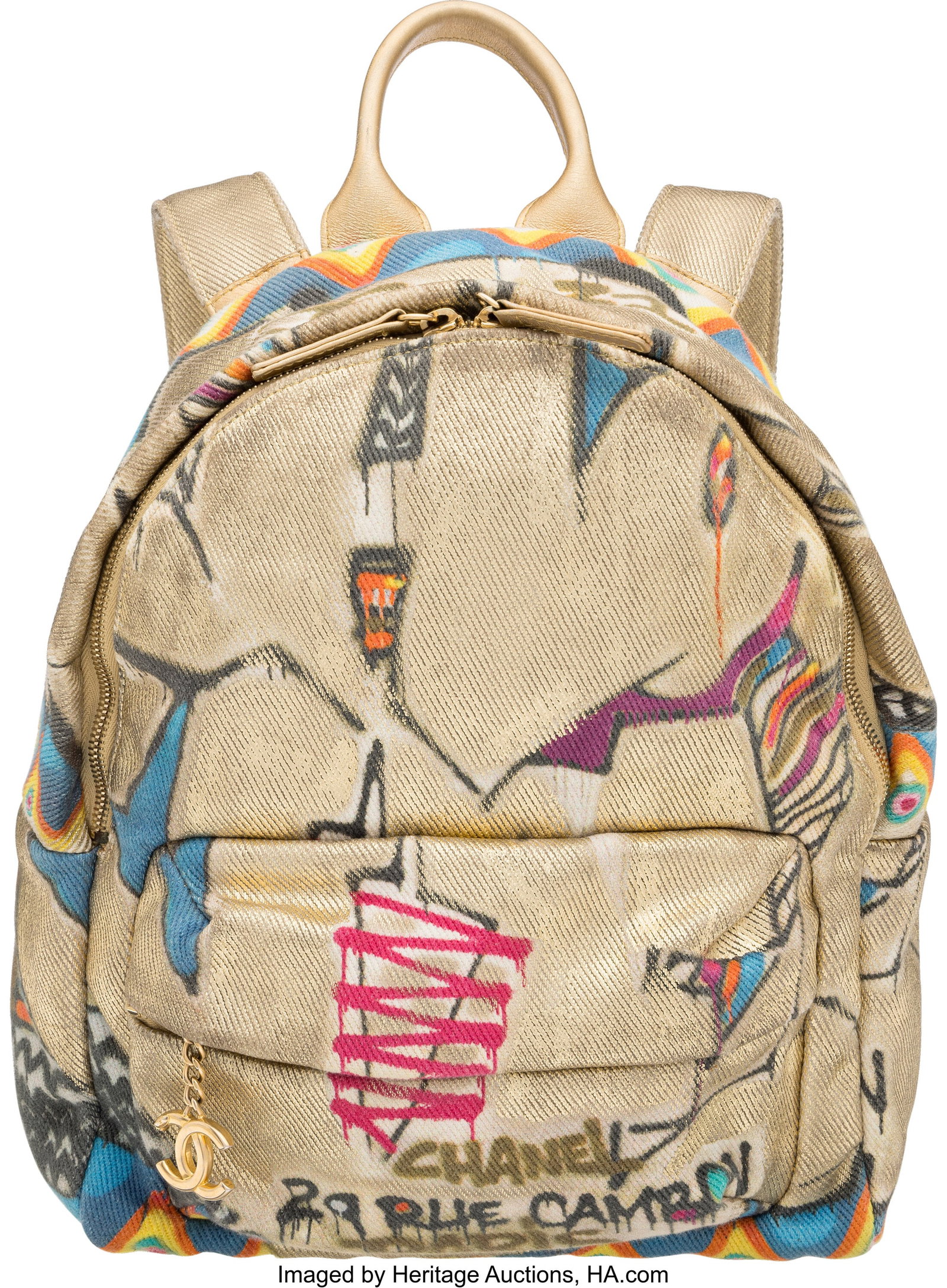 Chanel Paris-New York Gold & Multicolor Canvas S: Chanel Paris-New York Gold & Multicolor Canvas Street Spirit Backpack with Brushed Gold Hardware Métiers d'Art 2019 Condition: 2 11" Width x 15" Height x 7" Depth This bag is done in 