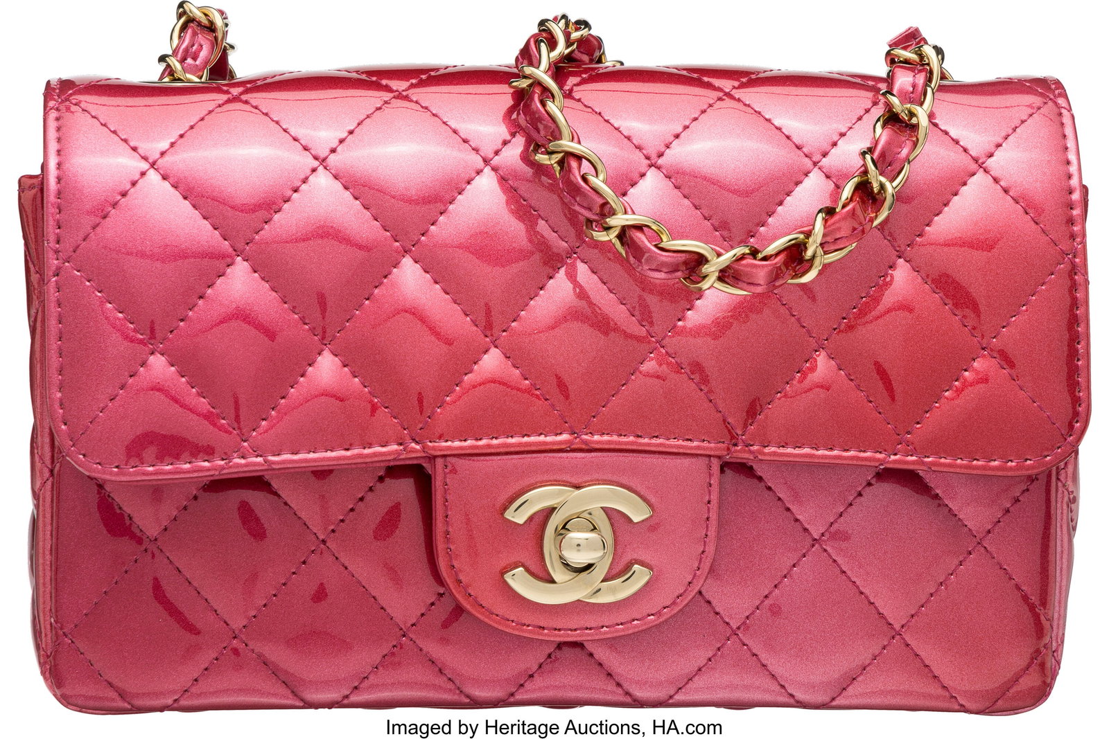 Chanel Metallic Pink Quilted Patent Leather Mini: Chanel Metallic Pink Quilted Patent Leather Mini Rectangular Flap Bag with Light Gold Hardware Condition: 2 8" Width x 5" Height x 2.5" Depth This bag is done in Metallic Pink Patent Leat