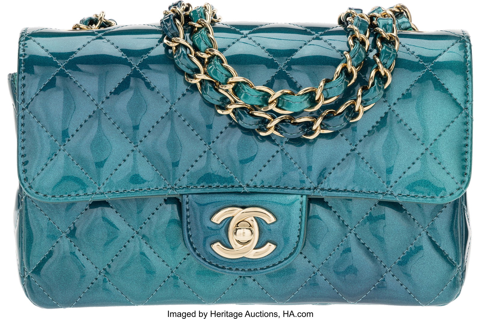 Chanel Blue & Green Iridescent Quilted Patent Le: Chanel Blue & Green Iridescent Quilted Patent Leather Mini Rectangular Flap Bag with Light Gold Hardware Condition: 2 8" Width x 5" Height x 2.5" Depth This bag is done in Blue and Gr