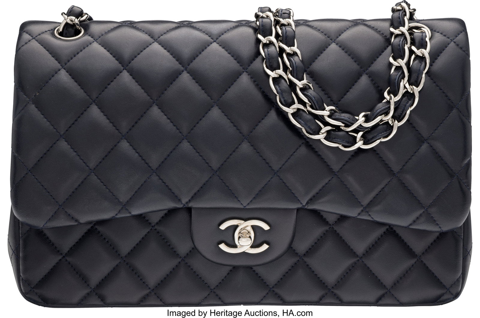 Chanel Navy Quilted Lambskin Leather Jumbo Class: Chanel Navy Quilted Lambskin Leather Jumbo Classic Double Flap Bag with Silver Hardware 2012 Condition: 2 12" Width x 7.9" Height x 3.9" Depth This bag is done in Navy Quilted Lamb