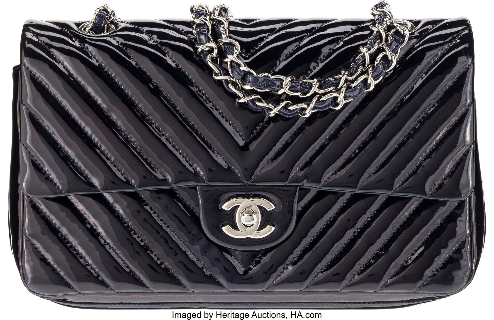 Chanel Navy Blue Chevron Quilted Patent Leather : Chanel Navy Blue Chevron Quilted Patent Leather Medium Classic Double Flap Bag with Silver Hardware 2015-2016 Condition: 2 10" Width x 6" Height x 2.5" Depth This bag is done in Navy Blue