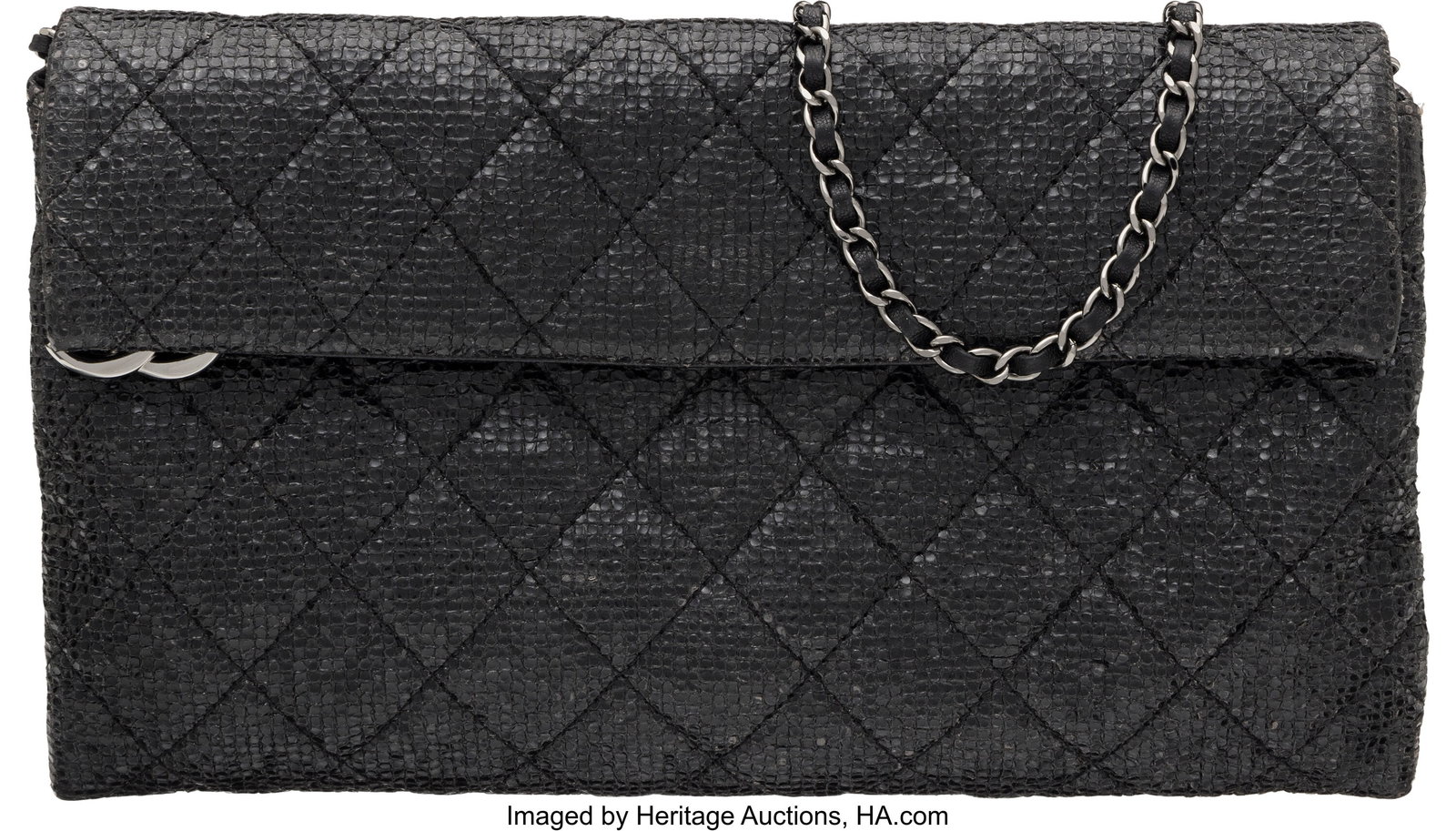 Chanel Limited Edition Christmas Collection Blac: Chanel Limited Edition Christmas Collection Black Quilted Textured Leather Clutch On Chain with Ruthenium Hardware 2014 Condition: 3 9" Width x 5.5" Height x 1.5" Depth This bag is