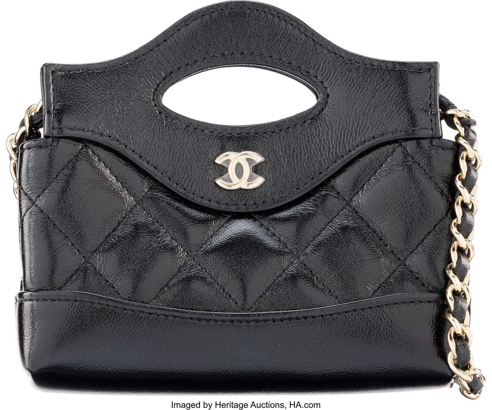 Chanel Shiny Black Quilted Calfskin Leather Nano: Chanel Shiny Black Quilted Calfskin Leather Nano 31 Shopping Bag with light Gold Hardware 2024 Condition: 1 5" Width x 4" Height x 1.5" Depth This bag is done in Shiny Black Calfskin Leat