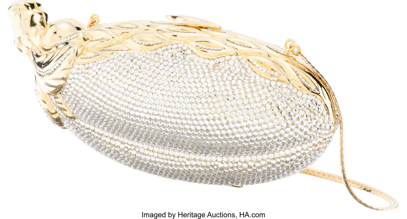 Judith Leiber Gold & Silver Crystal Eggplant Min: Judith Leiber Gold & Silver Crystal Eggplant Minaudière Condition: 1 6.5" Width x 3" Height x 3" Depth This minaudière is done in Gold-Plated Metal with Silver