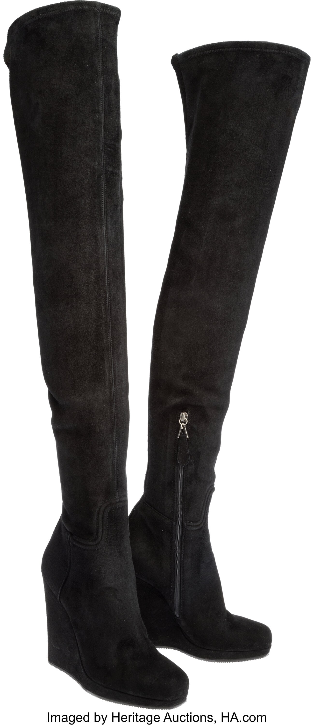 Alaia Black Suede Thigh High Wedge Boot Estimat: Alaia Black Suede Thigh High Wedge Boot Estimated Size: 7.5 Condition: 2 These boots are done in Black Suede, featuring a wedge heel and a partial side zipper closure.