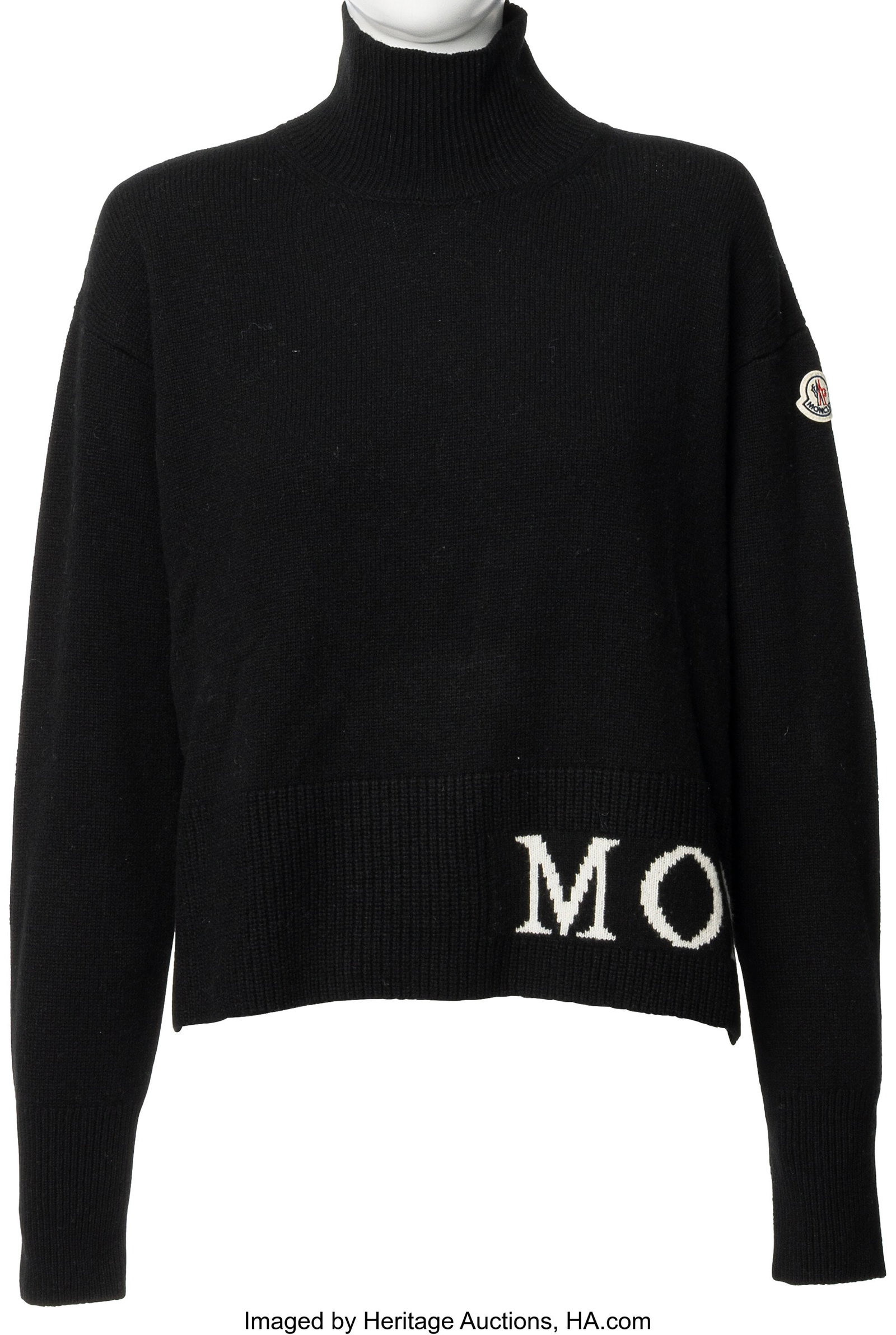Moncler Black & White Knit Sweater Condition: 1: Moncler Black & White Knit Sweater Condition: 1 Size XS This sweater is done in Black and White knit in a 70% Wool 30% Cashmere blend. The original retail tag is