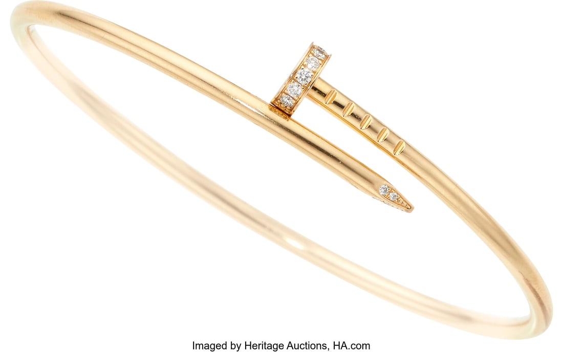 Cartier Diamond, Gold Bracelet Stones: Full-cut: Cartier Diamond, Gold Bracelet Stones: Full-cut diamonds weighing a total of approximately 0.25 carat Metal: 18k gold Marked: Cartier Collection: Juste un Clou Gro