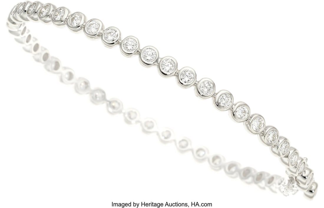 HKJT Diamond, White Gold Bracelet Stones: Full: HKJT Diamond, White Gold Bracelet Stones: Full-cut diamonds weighing a total of 3.37 carats Metal: 18k white gold Marked: for HJKT Partnership Gross Weight: 13&per