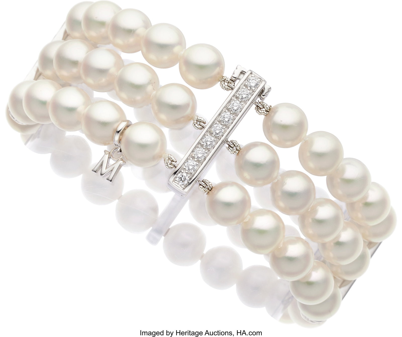 Mikimoto Cultured Pearl, Diamond, White Gold Bra: Mikimoto Cultured Pearl, Diamond, White Gold Bracelet Stones: Full-cut diamonds weighing a total of approximately 1.00 carat Pearls: Cultured pearls measuring 8.0