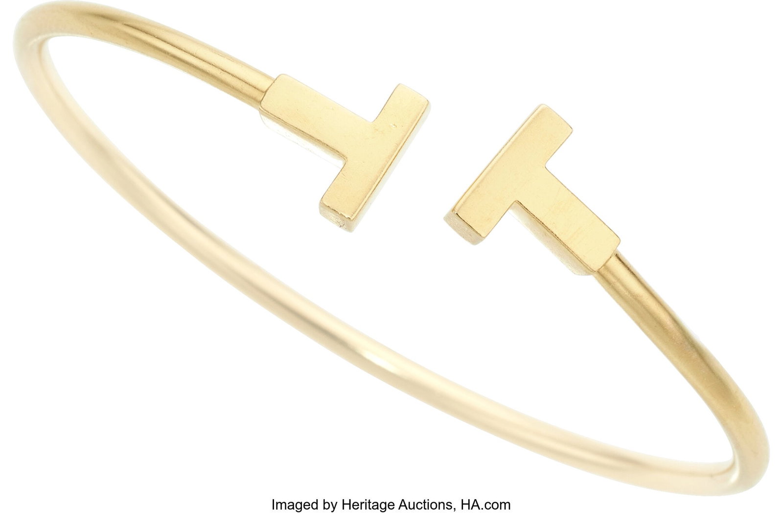 Tiffany & Co. Gold Bracelet Metal: 18k gold Mar: Tiffany & Co. Gold Bracelet Metal: 18k gold Marked: for Tiffany & Co. Collection: Tiffany T Gross Weight: 8.00 grams Dimensions: 6 inches x 3