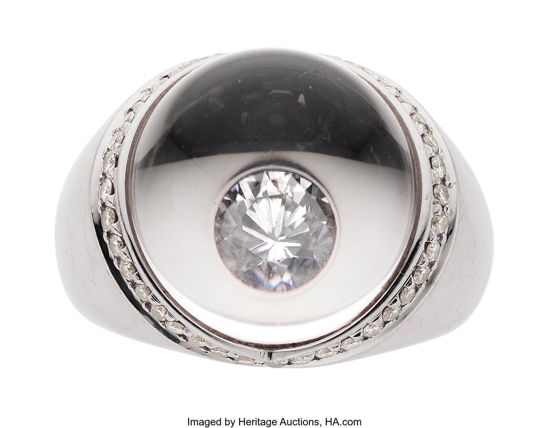 Mauboussin Diamond, Rock Crystal Quartz, White G: Mauboussin Diamond, Rock Crystal Quartz, White Gold Ring Stones: Round brilliant-cut diamond; full-cut diamond weighing a total of approximately 0.45 carat; carved r
