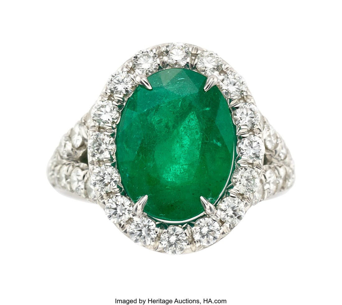 Van Busch Zambian Emerald, Diamond, Platinum Rin: Van Busch Zambian Emerald, Diamond, Platinum Ring Stones: Oval-shaped emerald weighing 5.85 carats; full-cut diamonds weighing a total of approximately 1.50 carats