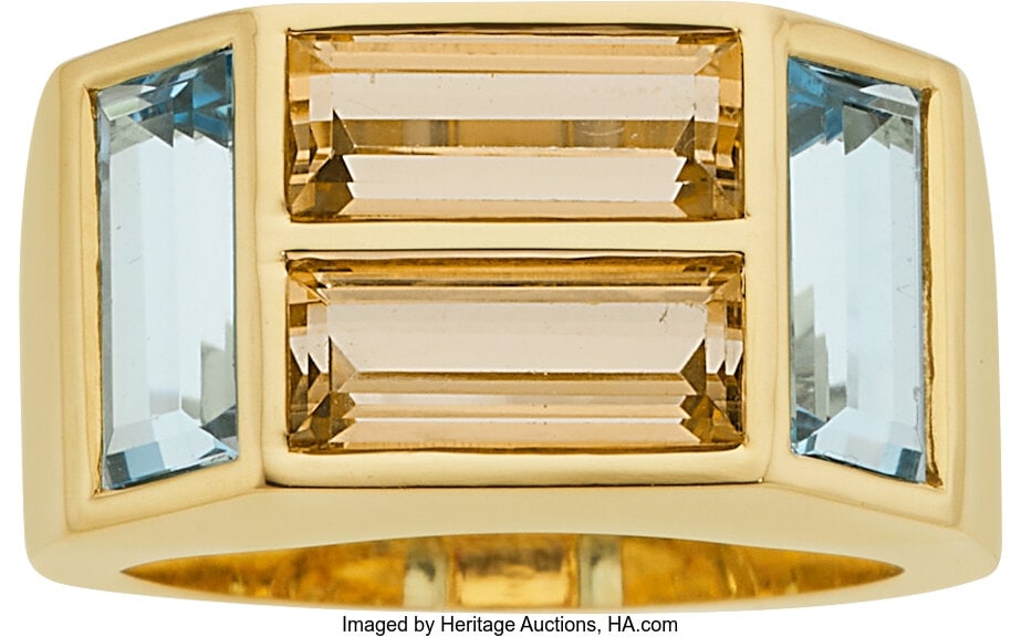 Paloma Picasso for Tiffany & Co. Aquamarine, Top: Paloma Picasso for Tiffany & Co. Aquamarine, Topaz Ring, circa 1980 Stones: Emerald-cut aquamarines weighing a total of approximately 1.80 carats; emerald-cut 