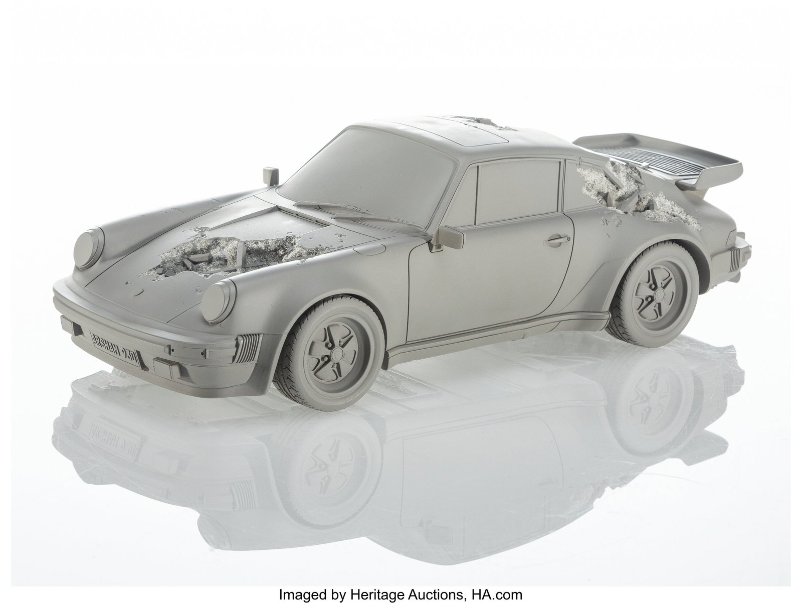 Daniel Arsham (b. 1980) Eroded Porsche 911 Turbo: Daniel Arsham (b. 1980) Eroded Porsche 911 Turbo (930) (Sculpture Edition), 2020 Hydrostone and quartz crystals 3-1/2 x 12 inches (8.9 x 30&p