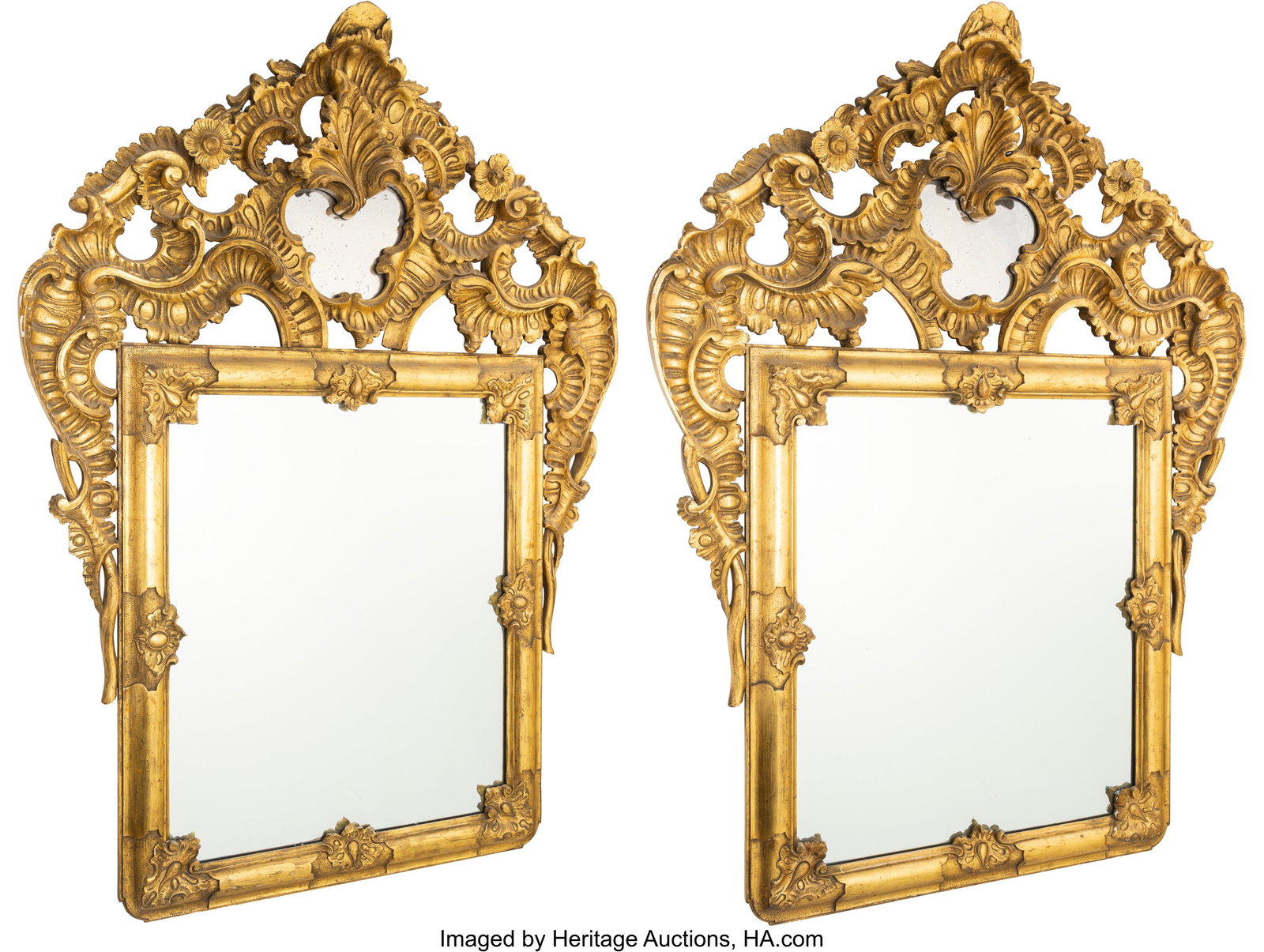 A Pair of Rococo Gilt Wood Mirrors 59 x 44 x 3-1: A Pair of Rococo Gilt Wood Mirrors 59 x 44 x 3-1/2 inches (149.9 x 111.8 x 8.9 cm) (each) Property from a Rancho Santa Fe, California Estate HID03101