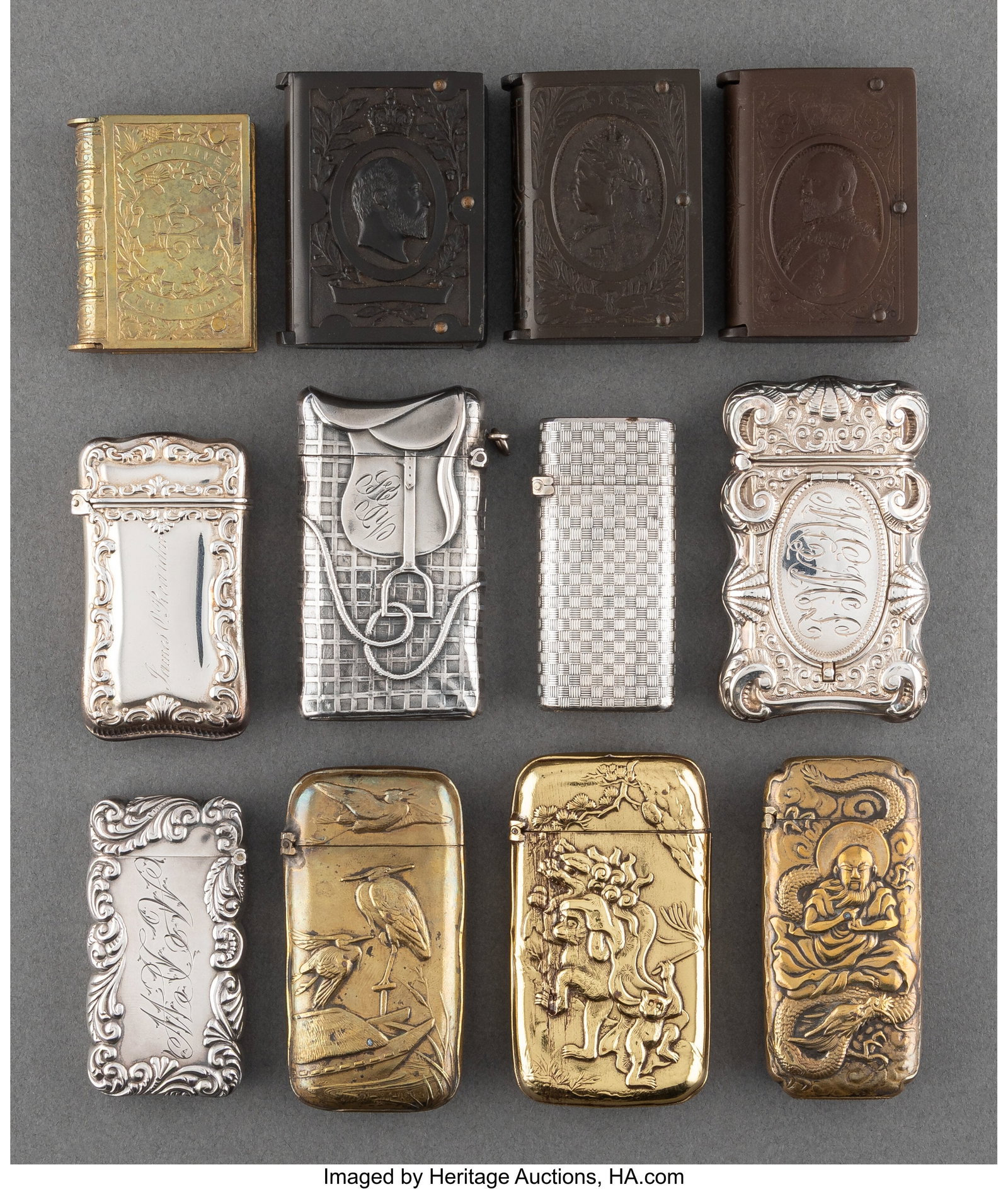 A Group of Twelve American Silver, Brass, and Pl: A Group of Twelve American Silver, Brass, and Plastic Match Safes, late 19th to early 20th century Marks to one: B, STERLING, 62 2-3/4 x 1-1/2 x 0-3/8 i