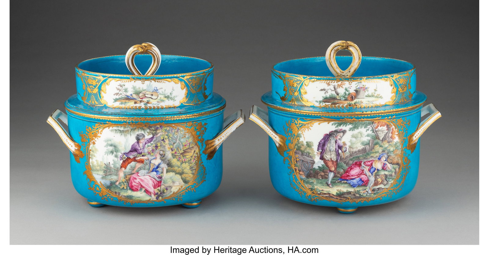 A Pair of Sèvres Partial Gilt and Bleu Céleste: A Pair of Sèvres Partial Gilt and Bleu Céleste-Ground Porcelain Covered Two-Handle Ice Pails, circa 1773 Marks: (blue interlaced Ls), (various) 7-1&