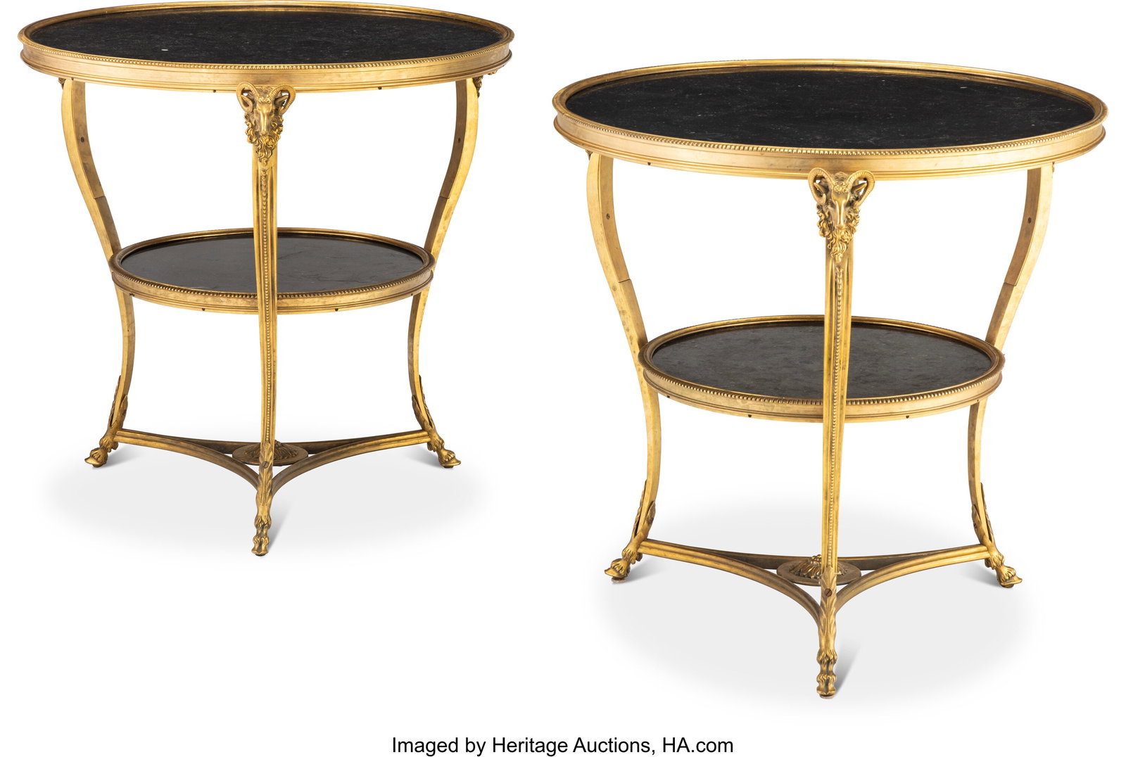 A Pair of Louis XVI-Style Gilt Metal-Mounted Guéridons with Black Marble Tops, 20th: A Pair of Louis XVI-Style Gilt Metal-Mounted Guéridons with Black Marble Tops, 20th century 27 x 27-1/2 inches (68.6 x 69.8 cm) (diam., each) PROVENANCE: Sotheby's, New York, Fine French and Continen