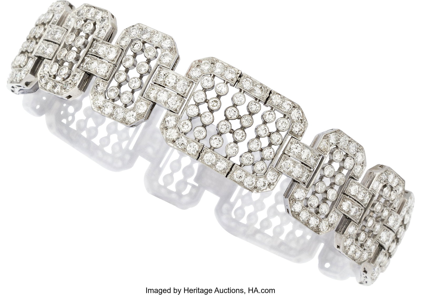 Diamond, Platinum Bracelet Stones: Full-cut dia: Diamond, Platinum Bracelet Stones: Full-cut diamonds weighing a total of approximately 10.00 carats Metal: Platinum Gross Weight: 49.00 grams Dimensions: 8-