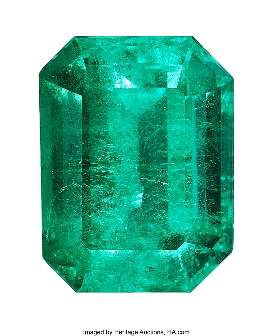 6.51 ct Colombian Emerald Shape: Octagonal Meas: 6.51 ct Colombian Emerald Shape: Octagonal Measurements: 12.81 x 9.74 x 7.72 mm Treatment: Clarity Enhanced (F2) Origin: Colombia Report&c